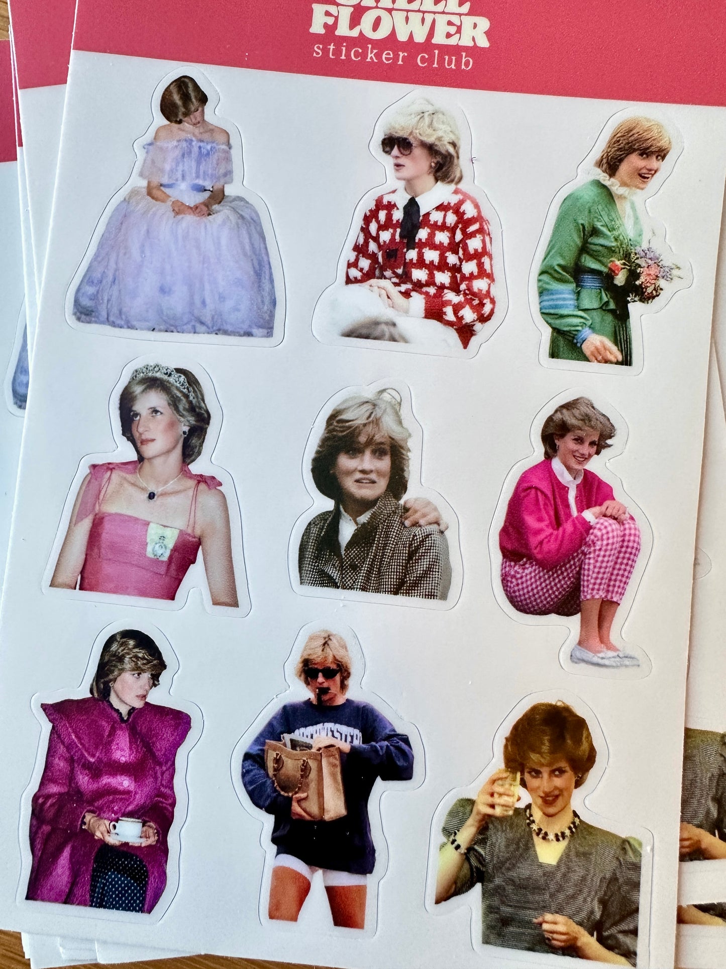 A sheet of die-cut stickers featuring multiple portraits of Princess Diana in different outfits, with a red header at the top that reads 'FLOWER sticker club'.